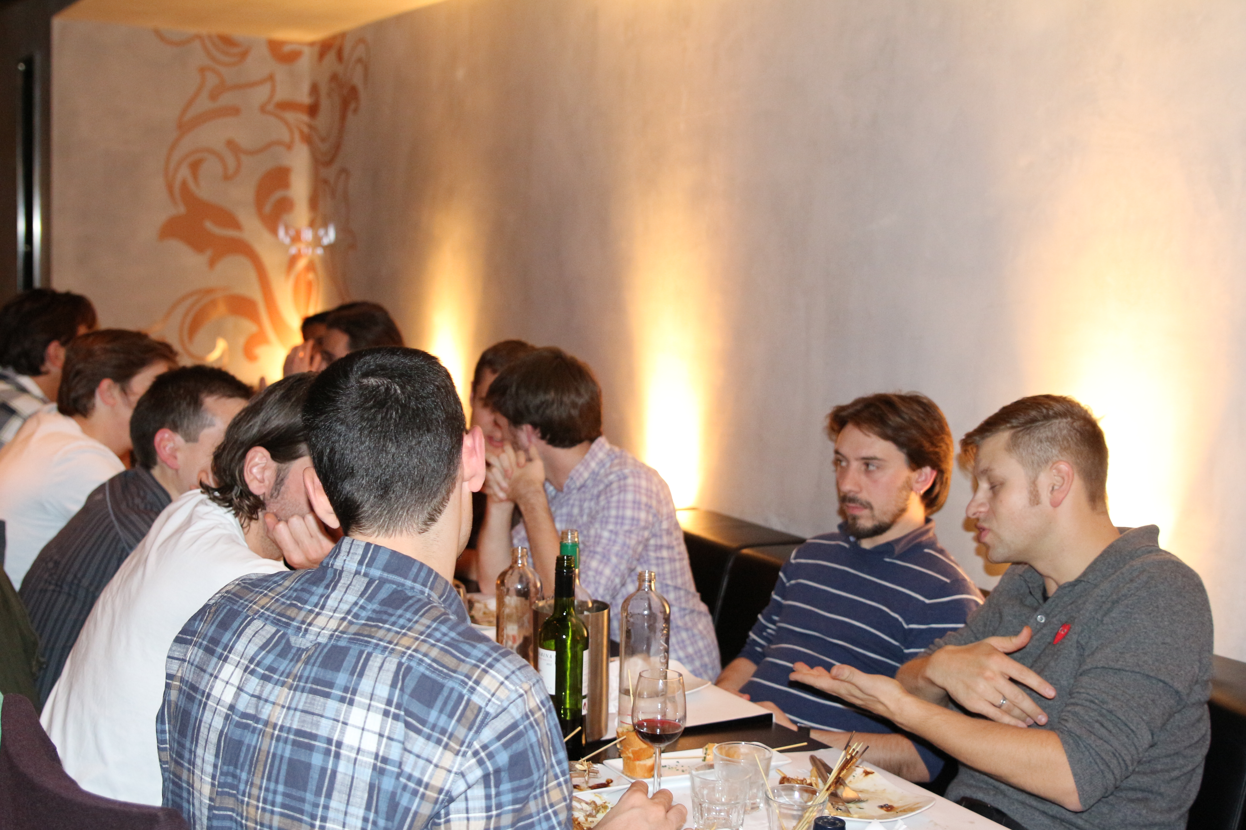 The dev team at our Wednesday night company dinner, still talking future features while eating Everything on a Stick.